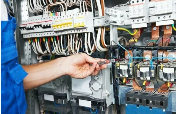 a technician performing building automation system maintenance